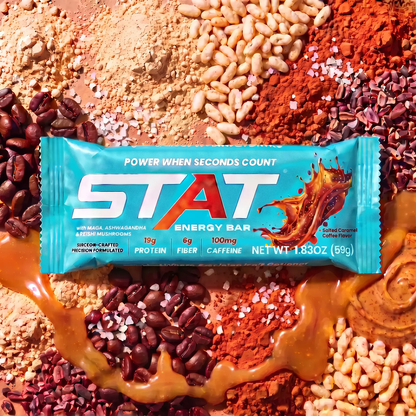 Wrapped STAT Salted Caramel Coffee bar on a spread of beans, grains and caramel